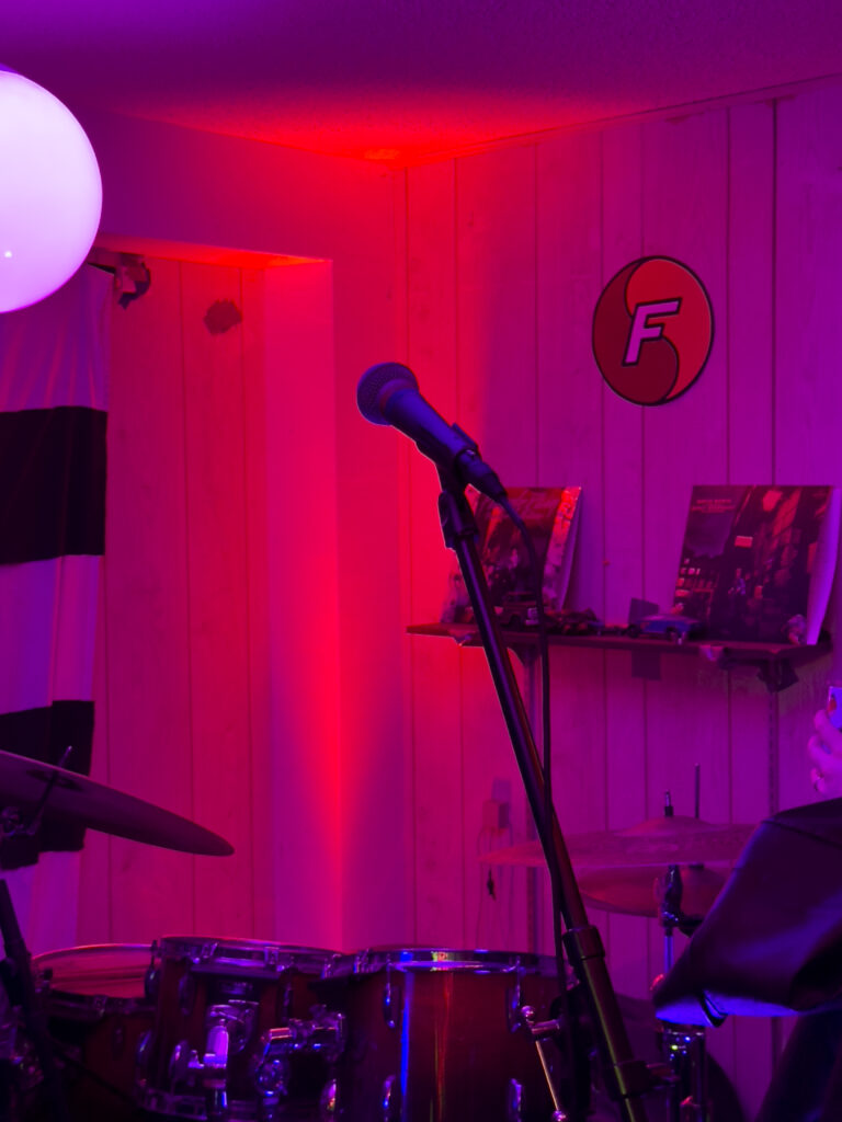 A microphone and drum kit await performers at Chop Shop in Minneapolis on March 23, 2024. Photo by Kristina Minic